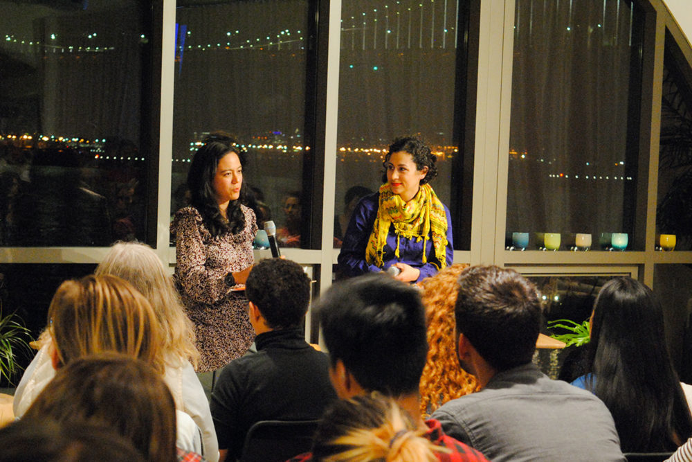 Speakers talking in front of an audience at a Foodwise Talk