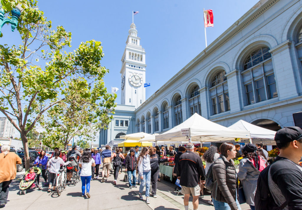 Ferry Plaza Farmers Market with Ferry Building in background